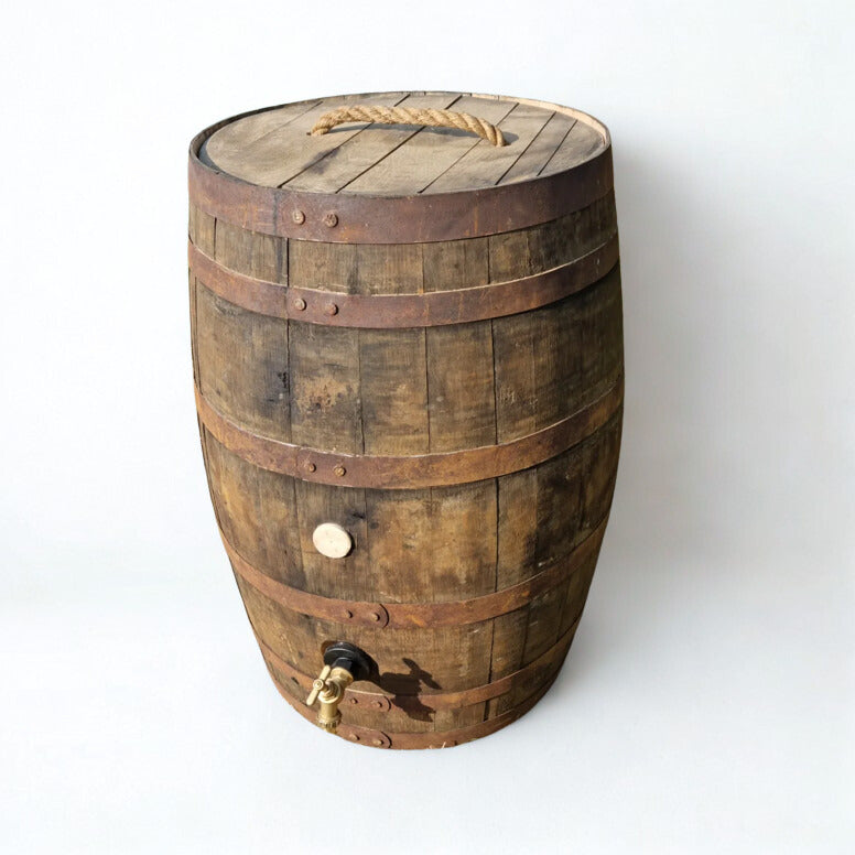 Wooden barrel with a lid on a white background