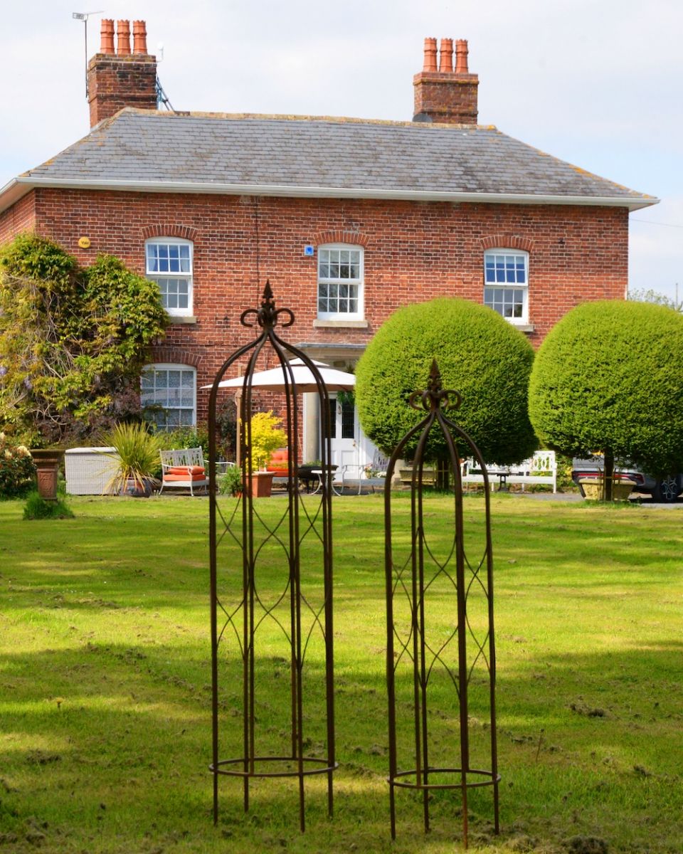 Set of Two Ornate Steel Garden Obelisks