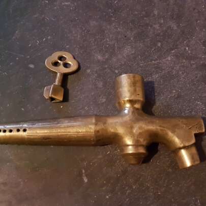 Brass tap with key